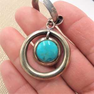 Sterling Silver and Genuine Turquoise Pendant with a Silver Tone Herringbone Chain