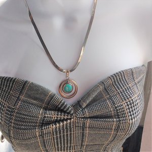 Sterling Silver and Genuine Turquoise Pendant with a Silver Tone Herringbone Chain