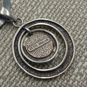 Sterling Silver and Genuine Turquoise Pendant with a Silver Tone Herringbone Chain