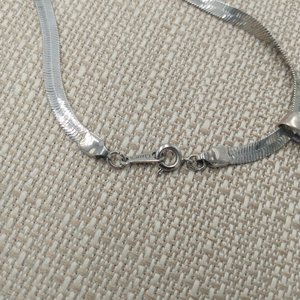 Sterling Silver and Genuine Turquoise Pendant with a Silver Tone Herringbone Chain