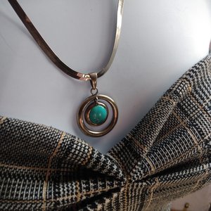Sterling Silver and Genuine Turquoise Pendant with a Silver Tone Herringbone Chain