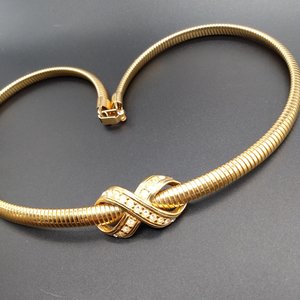 AVON Omega Gold Tone Collar Necklace with Infinity Criss Cross Rhinestone Pendant, 1990's