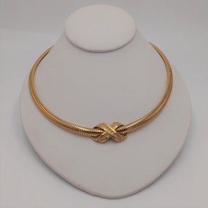 AVON Omega Gold Tone Collar Necklace with Infinity Criss Cross Rhinestone Pendant, 1990's