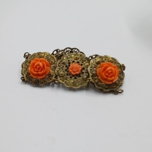 Vintage Gold Tone Panel Bracelet with Orange Celluloid Roses