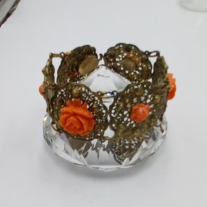 Vintage Gold Tone Panel Bracelet with Orange Celluloid Roses