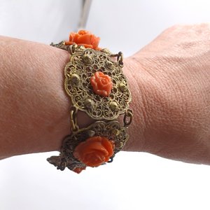 Vintage Gold Tone Panel Bracelet with Orange Celluloid Roses