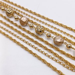 Mid Century Gold Tone Multi-strand Necklace and Clip-on Earrings Jewelry Set