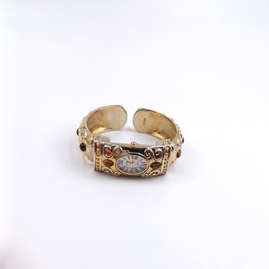 P.O.V. Gold Tone Ladies Clamper Fashion Watch with Tigers Eye, Runs