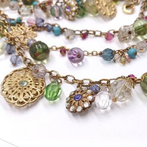 Flirty Gold Tone Multi-strand Baubles and Charms Statement Bib Necklace