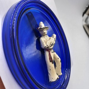 Vintage Cobalt Glass Oval with a Metal Mexican Man Wall Ornament