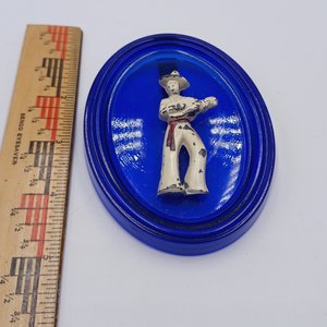 Vintage Cobalt Glass Oval with a Metal Mexican Man Wall Ornament