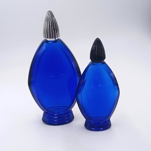 Two Bourjois Cobalt Blue Glass "Evening in Paris" Perfume Bottles with Lids, Vintage