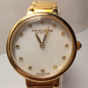 AKRIBOS XXIV Gold Tone Diamond Dial Ladies Quartz Wrist Watch- New Battery