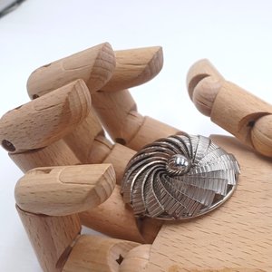 Kramer of New York Silver Tone Round Spiral Brooch