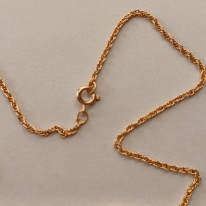Gold Tone with Rhinestone Center on Gold Tone Rope Chain Pendant Necklace