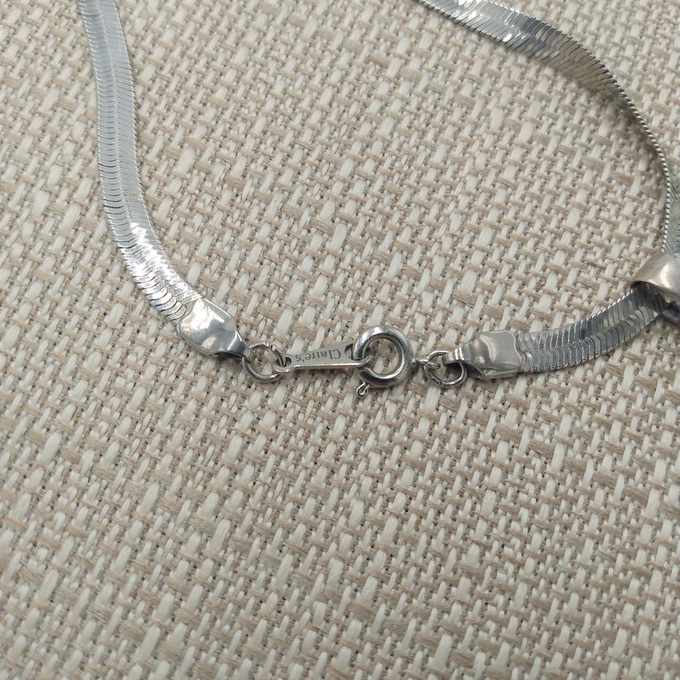 Sterling Silver and Genuine Turquoise Pendant with a Silver Tone Herringbone Chain