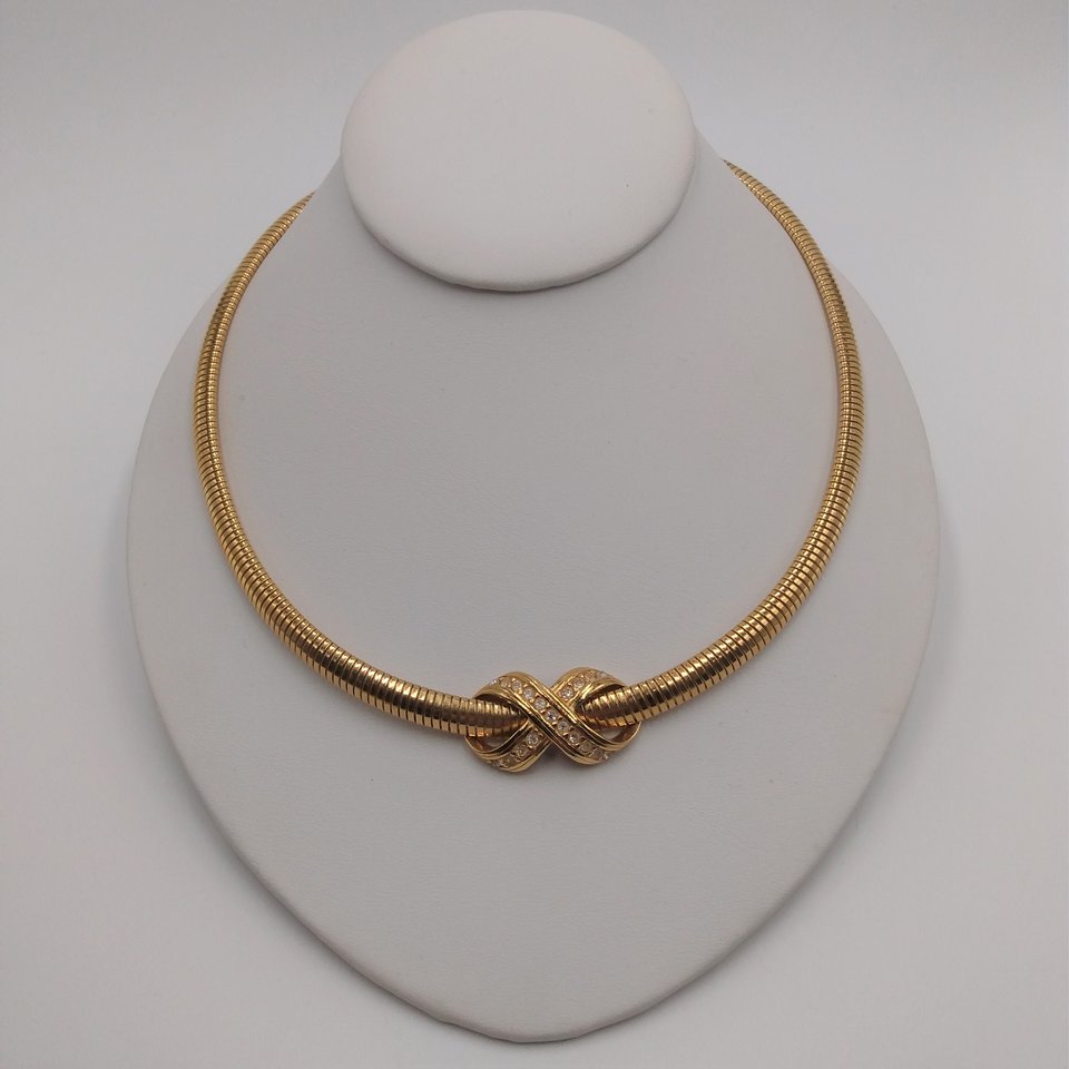 AVON Omega Gold Tone Collar Necklace with Infinity Criss Cross Rhinestone Pendant, 1990's