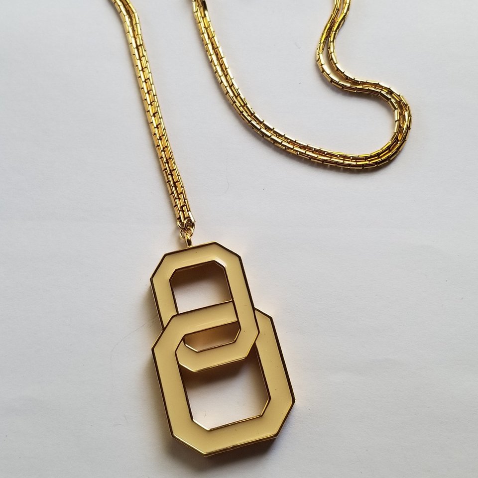 MONET Gold Tone and Light Cream Yellow Enamel Interlocking Links Pendant and Snake Chain