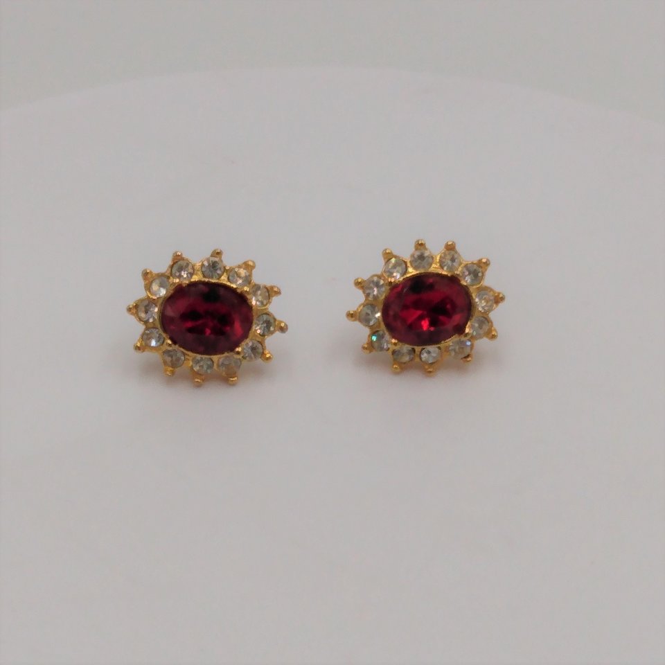 Sparkling Vintage Rosa Gold Tone Clear Rhinestones Surrounding a Larger Red Oval Rhinestone Stud Earrings