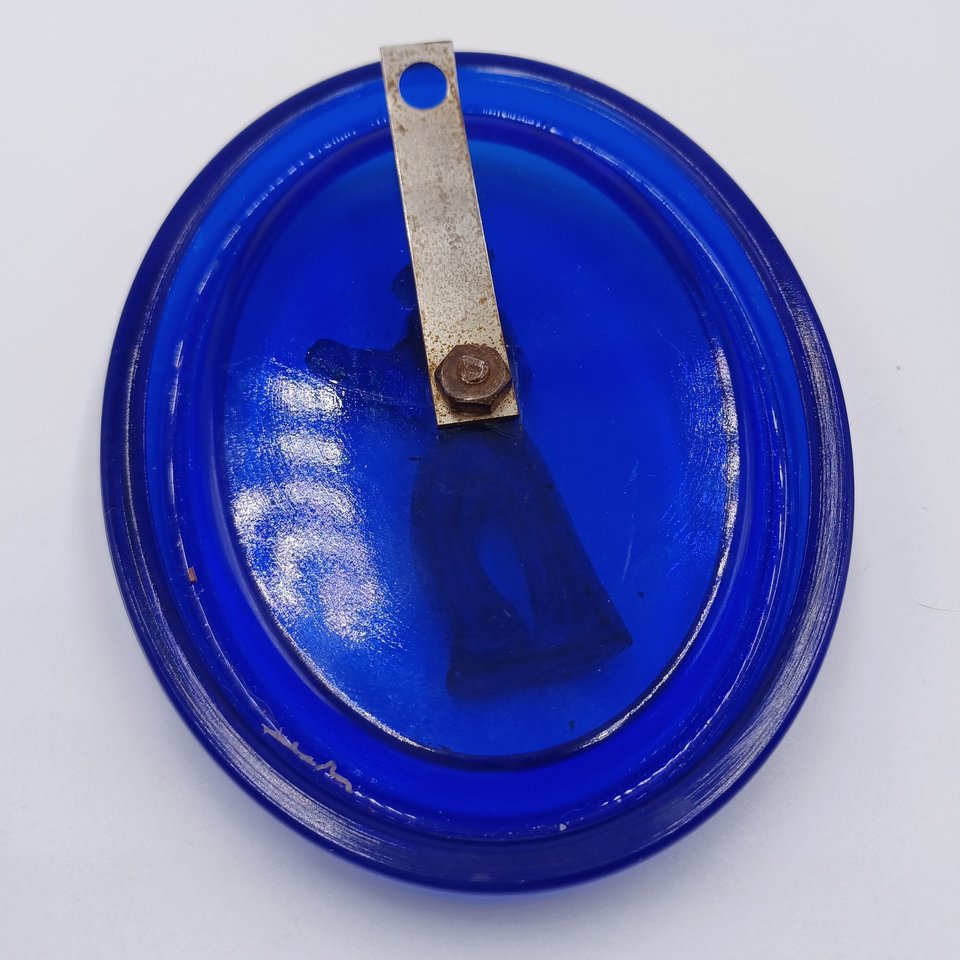 Vintage Cobalt Glass Oval with a Metal Mexican Man Wall Ornament