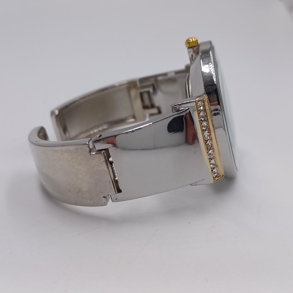 Vintage Geneva Silver and Gold Tone Clamper Bracelet Fashion Watch, Runs