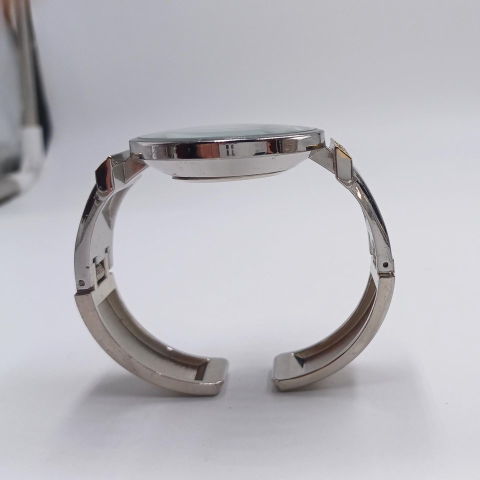 Vintage Geneva Silver and Gold Tone Clamper Bracelet Fashion Watch, Runs