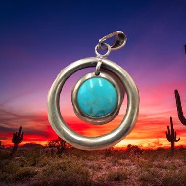 Sterling Silver and Genuine Turquoise Pendant with a Silver Tone Herringbone Chain