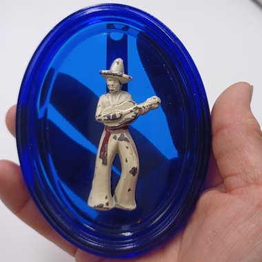 Vintage Cobalt Glass Oval with a Metal Mexican Man Wall Ornament